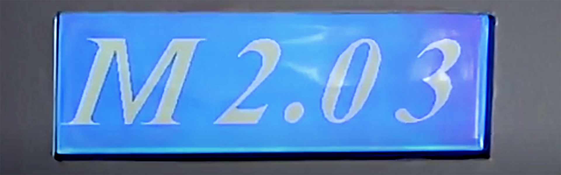 a blue rectangular sign with white text
